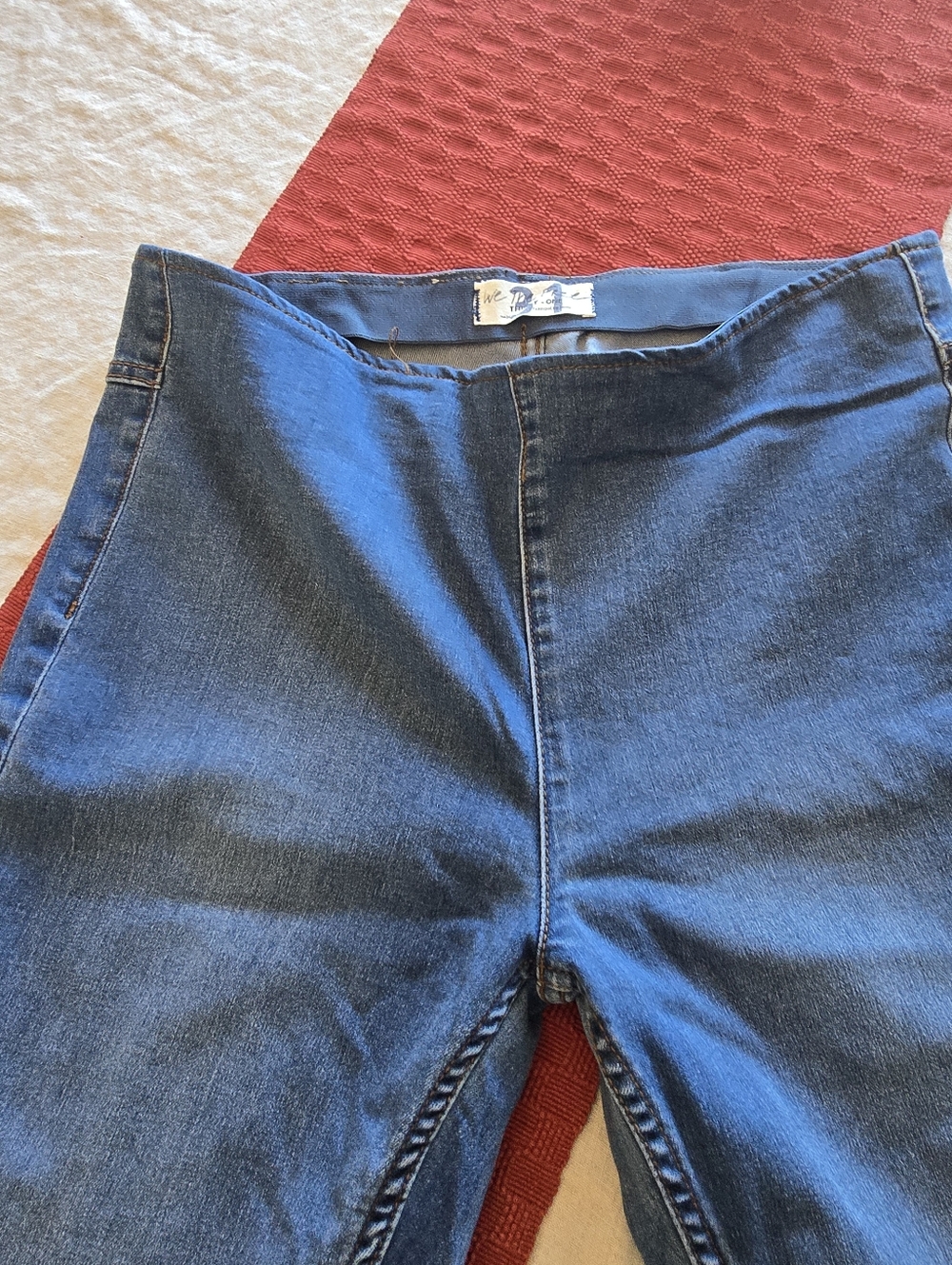 We The Free light blue denim waist label detail